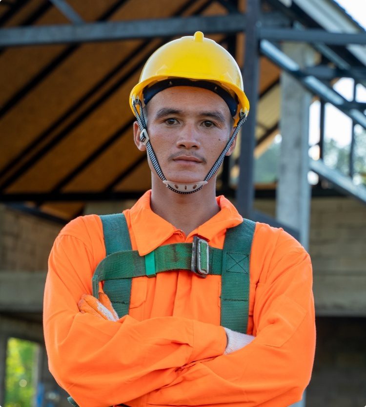 An energy service experts is standing in front of a energy project.